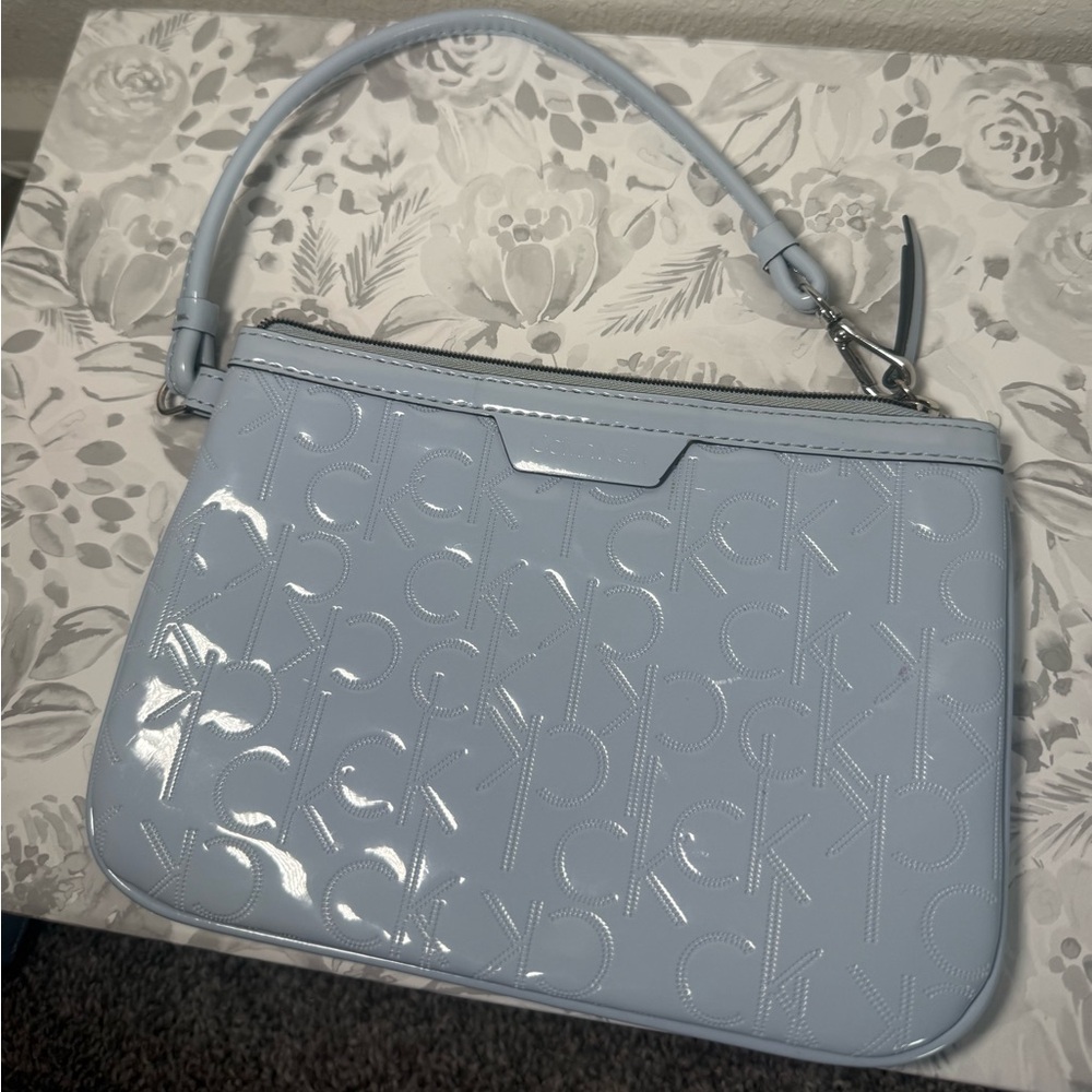Calvin Klein Sky Blue Embossed Clutch
